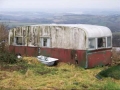 white red scrap caravan